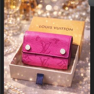 Louis Vuitton Taiga Rama Discovery Compact Wallet in a stunning hot pink color